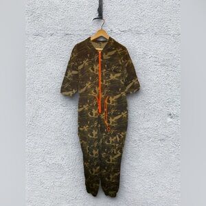 Camouflage Jumpsuit with Orange Accents